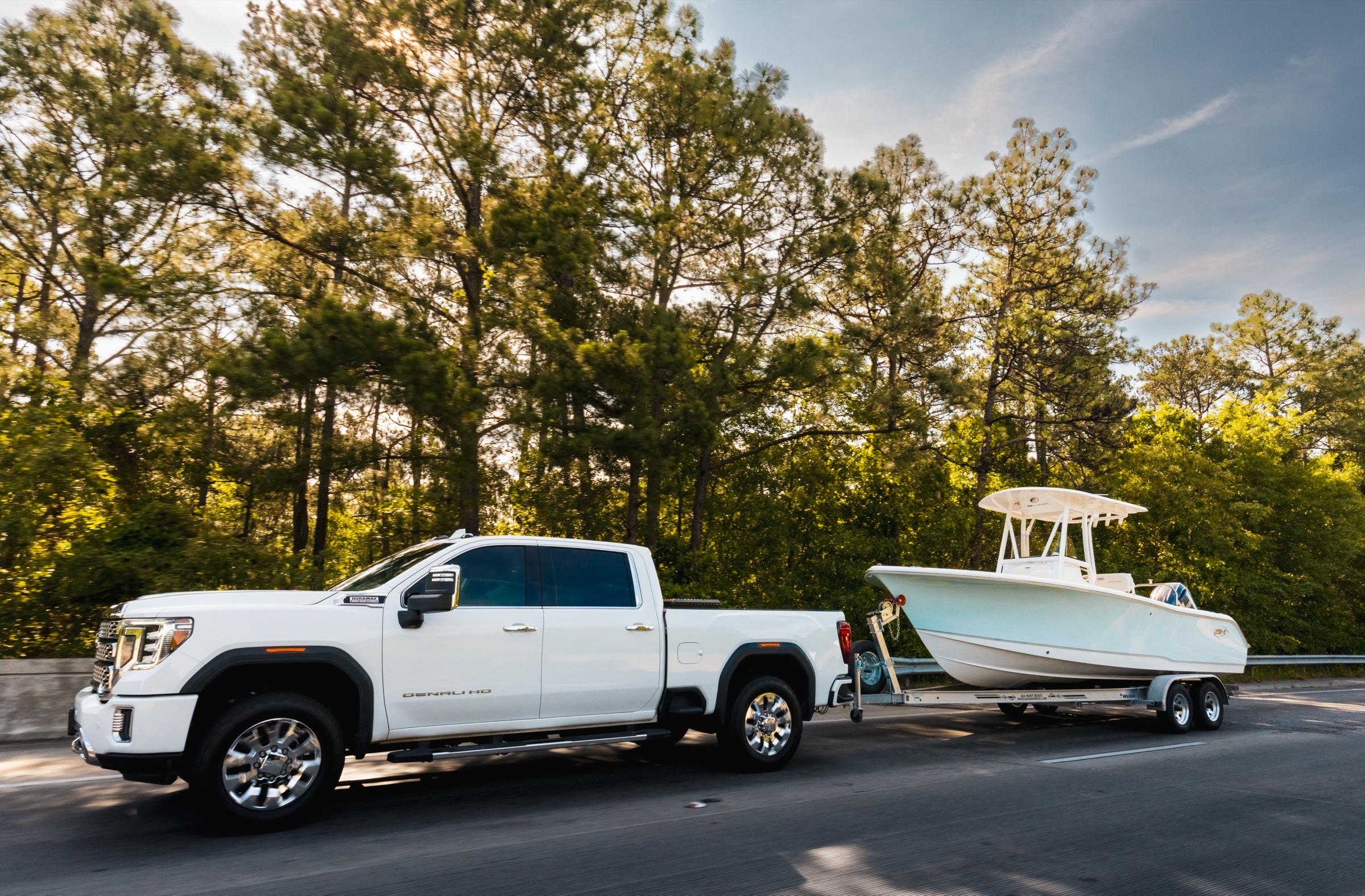 Truck towing a boat on a trailer